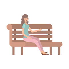 beautiful and young woman sitting on wooden chair