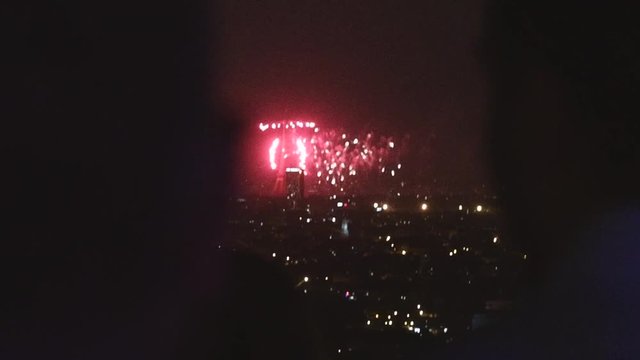 fireworks view from skyscraper terrace above Paris