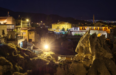 Night view of the Uchisar town. The cave city in Cappadocia. Turkey