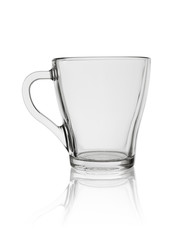 transparent glass cup with the handle for tea or coffee isolated on a white background