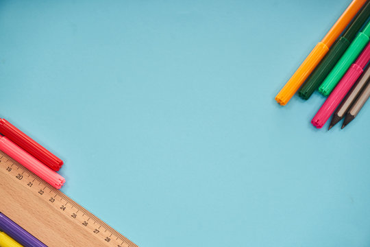 Office Supplies On Blue Background