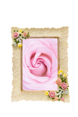 photo frame with rose texture around border isolated on white and inside with a pink rose photo