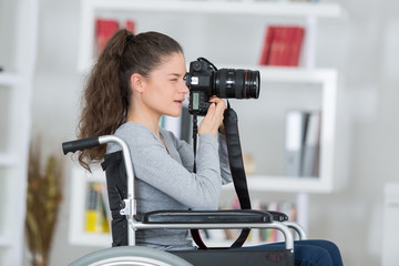 female photographer on wheelchair
