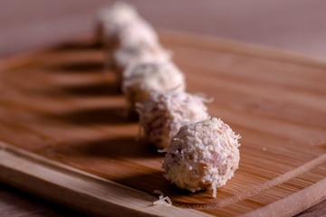 Tasty cheese balls served in the wooden plate