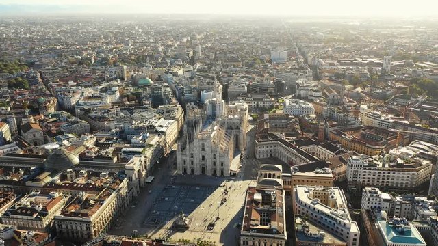 Aerial panoramic view of cityscape of Milan, historic part of city with gothic Milan Cathedral, landscape panorama of Italy from above, Europe