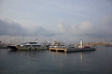 Fototapeta premium pier for yachts at sunrise in Alicante Spain