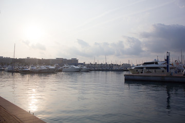 Fototapeta premium pier for yachts at sunrise in Alicante Spain