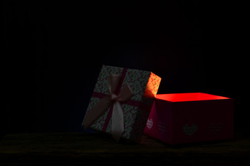 Gift box in the dark with copy space for text.