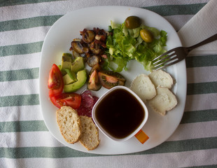cheese, tomatoes, egg, coffe, vegetables and bread for breakfast