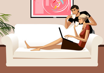 Young couple with coffee and laptop