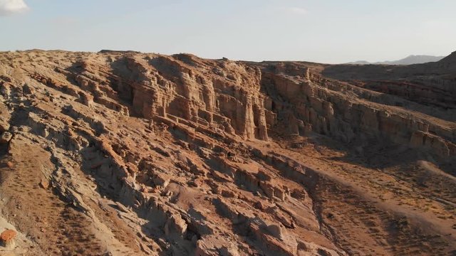 Aerial Shot of Sandstone Rock Formation in Desert Canyon
