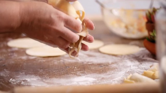 Step by step. Rolling dough for home made empanadas