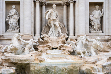 The Trevi fountain with Oceanus, god of the sea, in the center in Rome, Italy