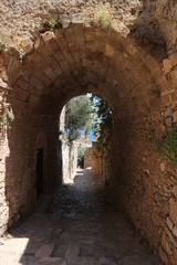 Fototapeta na wymiar Arch on a medieval street, Monemvasia, Peloponnese, Greece