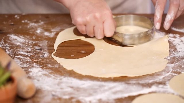 Step by step. Rolling dough for home made empanadas