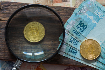 bitcoins on the background of the Brazilian flag