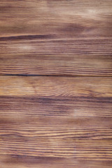 Precious wood texture. Of rustic aspect and dark, ocher, brown, toasted, black tones. The veins and knots are appreciated.