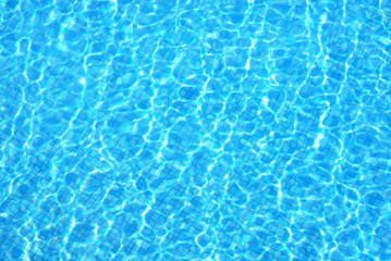 Fototapeta na wymiar Top view of Blue ripped water in swimming pool