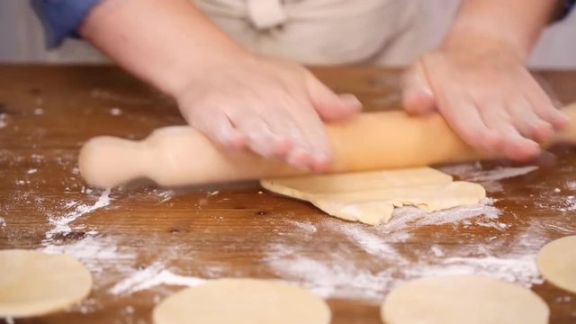 Step by step. Rolling dough for home made empanadas