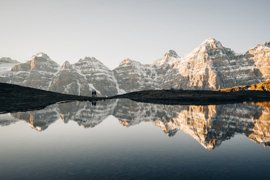 Landscape with lake reflecting mountains