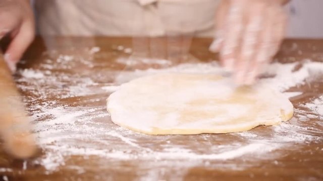 Time lapse. Step by step. Rolling dough for home made empanadas