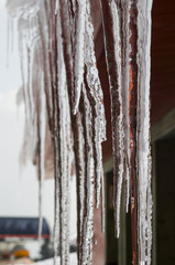 icicles on the roof of the cottage - snow centre
