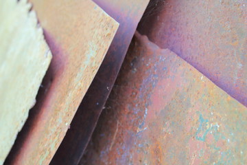 Old rusty thin iron sheets. Close-up. Background. Texture.