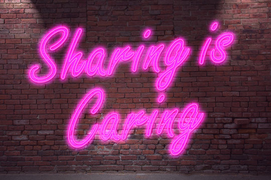Sharing is Caring Neon Lettering on Brick Wall