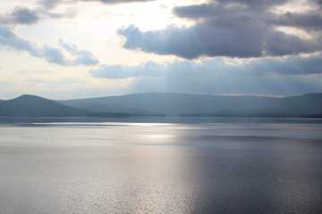 Beautiful view of the lake and the mountains. Landscape. Panorama. Background.