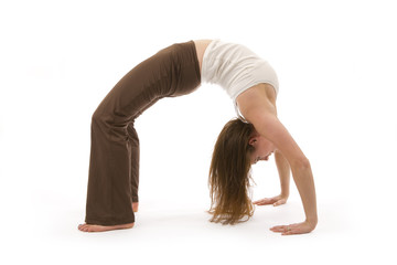Healthy, attractive young woman practicing yoga pose