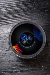 camera lens on dark background close-up