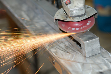 Closeup of angle grinder making sparks