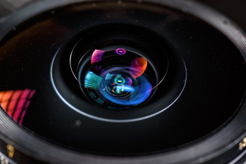 camera lens on dark background close-up
