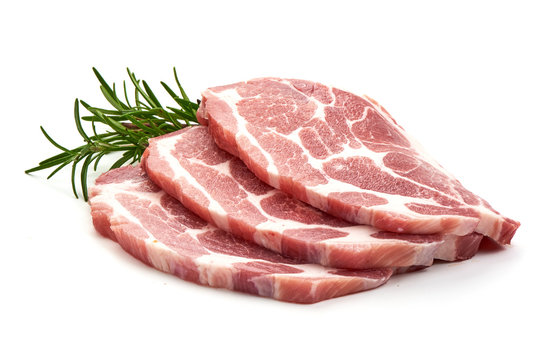 Meat, pork, slices pork loin with herbs, isolated on a white background