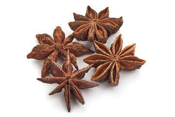 Anise star, badian spice, close-up, isolated on a white background.