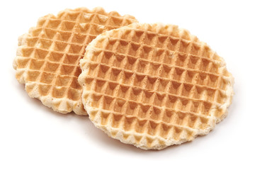 Round Belgium Waffles, close-up, isolated on white background.