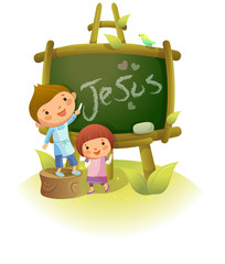 Boy writing Jesus on a blackboard