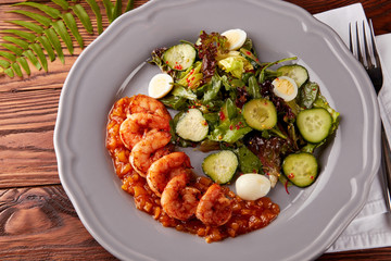 Healthy salad with grilled shrimps