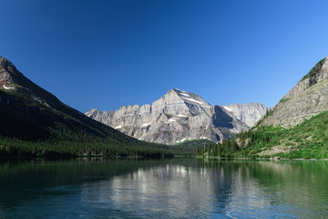 Fototapeta premium Beautiful reflection on Josephine Lake, Glacier National Park