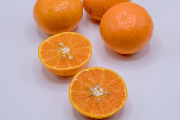 Fresh oranges on isolate white background .