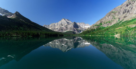 Fototapeta na wymiar Beautiful reflection on Josephine Lake, Glacier National Park
