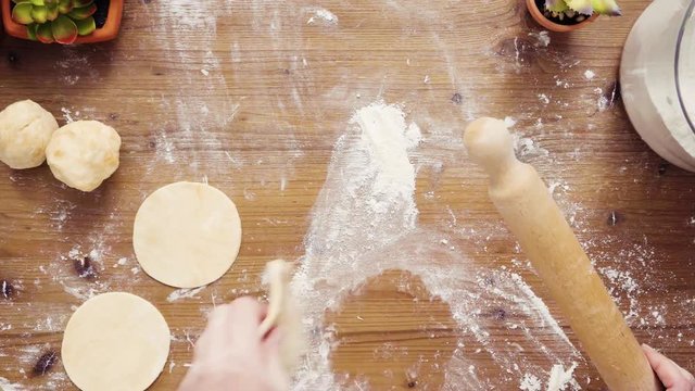 Flat lay. Step by step. Rolling dough for home made empanadas