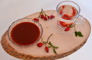 rosehip products on wooden presentation plate