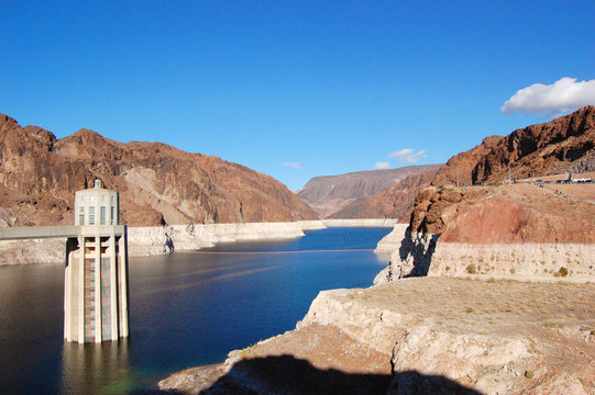 Hoover Dam, once named as Boulder Dam, is located on the border between Nevada and Arizona, USA.