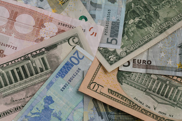 Fototapeta na wymiar Euro (EUR) and US dollars (USD) currency. Banknote background. Major reserve currencies