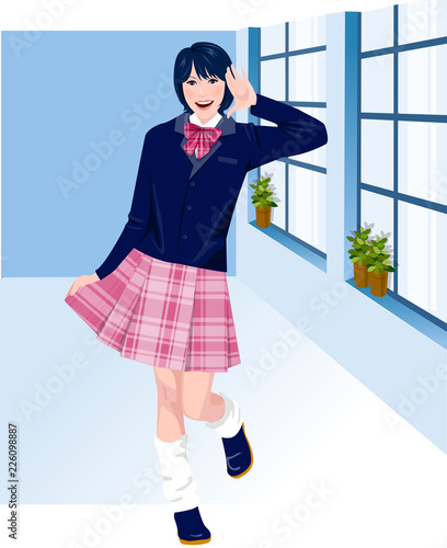 Portrait of a teenage girl saluting