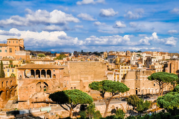 Fototapeta na wymiar Panoramic view of the Roman Forums, ruins of Ancient Rome. Forum Romani.