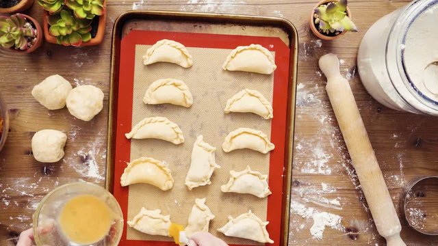 Flat lay. Step by step. Making home made sweet empanadas with red apples