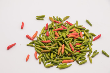 Red and green chilli pepper isolated on white background. common names : Small Chilli Padi, Bird's Eye Chilli in Capsicum annuum Solanaceae family.