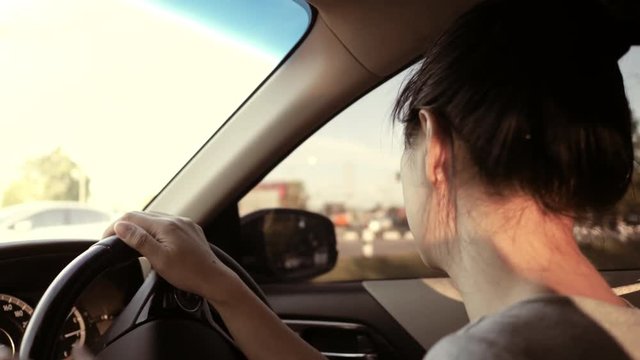 woman driving vehicle car road trips